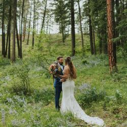 Couple in Forest with lupine blooming