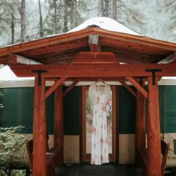 Bride's dress outside yurt